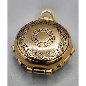 Vintage Coro Signed Four frame Gold-tone Locket holds four photos